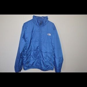 Blue puffy North Face jacket